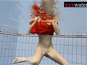 fabulous super-fucking-hot woman swimming in the pool